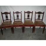 A set of 4 Edwardian dining chairs.