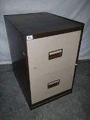 A 2 drawer metal filing cabinet.
