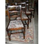 A set of 4 dining chairs.