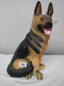 A figure of an Alstation (German Shepherd) dog in good condition, 36 cm tall.