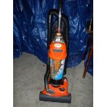 A VAX 1700 vacuum cleaner in working order.