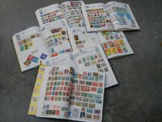 6 part filled stamp albums.