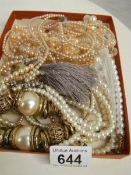 A mixed lot of jewellery including simulated pearls.