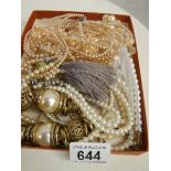 A mixed lot of jewellery including simulated pearls.