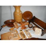 A mixed lot of wooden items including 1920's book rack, printing blocks, bowl, vase etc.