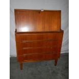 A teak desk in good condition for age, 81 x 40 x 108 cm.