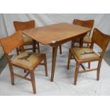 An Ercol style extending table with 4 chairs in need of restoration, 175 x 74 cm x 175 cm high.