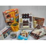 A mixed lot of interesting items including truck construction set, large quantity of marbles etc.