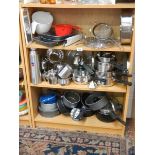 3 shelves of assorted kitchen ware including saucepans etc.