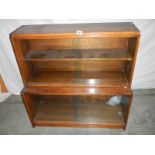 A Wernick style glass fronted book case, H 71, W 53, D 47 cm.