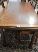 A good oak extending dining table with 6 chairs, 180 x 90 cm.