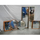 6 mirrors in various shapes and sizes.