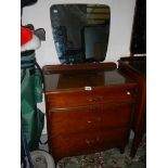 A clean 3 drawer dressing table with mirror back.