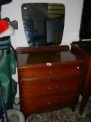 A clean 3 drawer dressing table with mirror back.