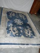 A 5 dragon plush carpet in good condition but needs a clean, approximately 2 x 3 m.