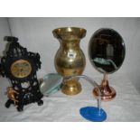 A large brass vase, a bevelled mirror, a magnifying glass, a painted clock etc.