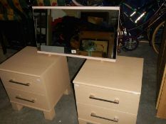 Two 2 drawer bedside chests and a free standing mirror.