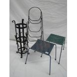 An umbrella stand, 2 woven stop stools and a steel rack.