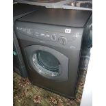 A Hotpoint Aquarius VTD 20 6kg reverse action washing machine, very clean.