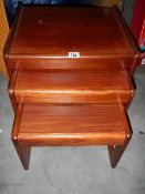 A nest of 3 mahogany tables in good condition,.