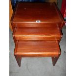 A nest of 3 mahogany tables in good condition,.