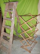 An old wooden step ladder and a clothes airer.