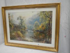 A good framed furnishing print depicting fisher man in a river.