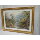 A good framed furnishing print depicting fisher man in a river.