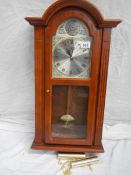 An Actim 'Tempus Fugit' clock with Westminster chime.