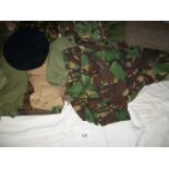 A good large lot of camouflage / khaki jackets, trousers, caps, bags etc., 18 items in total.