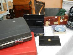 A mixed lot including picnic set, cases, briefcase, Wedgwood plate etc.