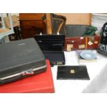 A mixed lot including picnic set, cases, briefcase, Wedgwood plate etc.