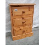 A 3 drawer pine bedside chest (59 x 38 x 29 cm).