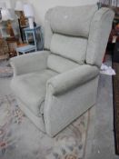 An electric reclining arm chair in good condition.