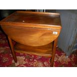 A good mahogany drop leaf trolley with mahogany gallery.