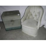 A deep buttoned bedroom chair and a small ottoman.