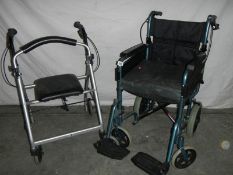 A "Dav's" folding wheelchair with foot rests and a walking aid.