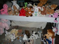 A large quantity of soft toys including Bugs Bunny, MIckey Mouse etc., In excess of 30 in total.