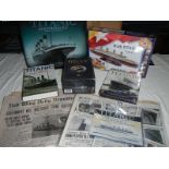 A mixed lot of Titanic items, jigsaw puzzle, newspapers, book etc.