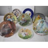8 collector's plates including Wedgwood.