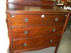 A mahogany 3 drawer chest.