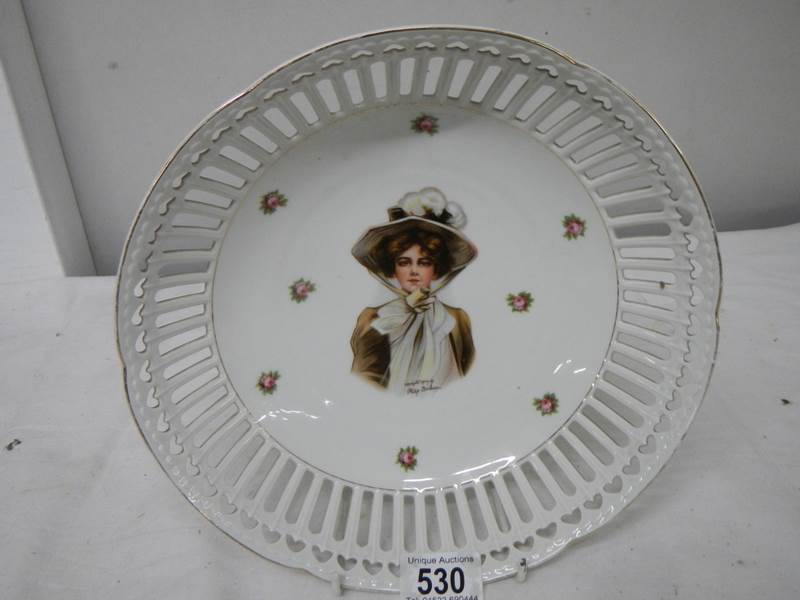 A hand painted and signed dish, 26cm diameter, in good condition. - Image 4 of 4