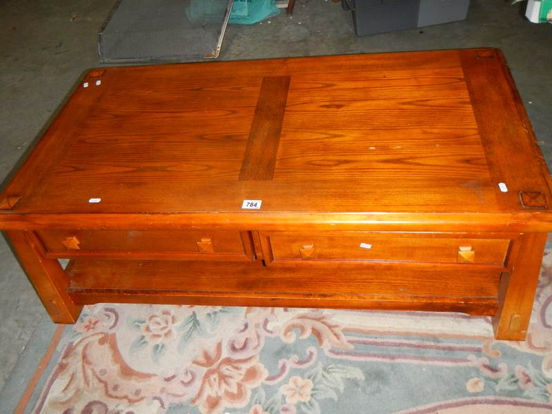 A low 2 drawer coffee table.