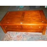 A low 2 drawer coffee table.