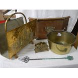 A mixed lot of brass ware including magazine rack, jam pan, fire front etc.