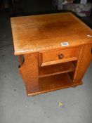 A good oak magazine rack with drawer.