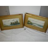 A pair of framed and glazed rural scene watercolours signed S Russell.