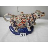 A Chinese cow creamer.