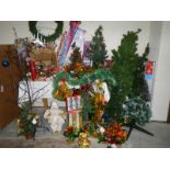 A mixed lot of Christmas decorations including trees.