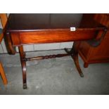 A mahogany drop side sofa table.